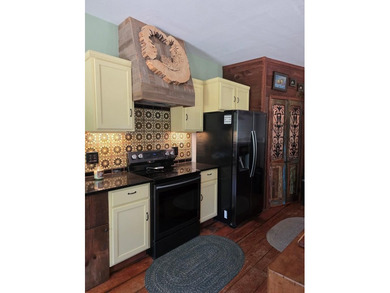 Priced to Sell Quick! Acreage, home, barn, and lake life! This - photo 9
