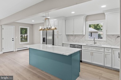 This charming rancher has undergone a complete renovation and - photo 8
