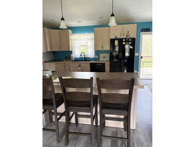 Completely remodeled and move-in ready! This updated 1,400 SF - photo 9