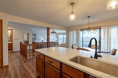 Experience lake life at its finest in this stunning two-level, 1 - photo 11