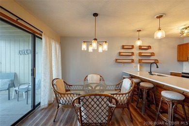 Experience lake life at its finest in this stunning two-level, 1 - photo 13