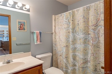 Experience lake life at its finest in this stunning two-level, 1 - photo 14