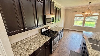 25 mins to the beach! Welcome to 400 Lilly Bell, open-plan - photo 14