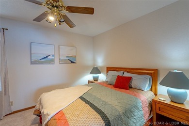 Experience lake life at its finest in this stunning two-level, 1 - photo 16
