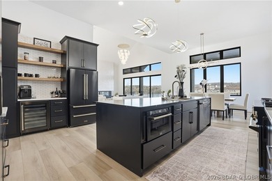 This striking new-construction estate commands panoramic main - photo 11