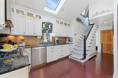 Experience life on the water in this beautifully updated - photo 12