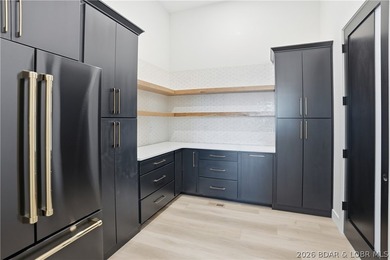 This striking new-construction estate commands panoramic main - photo 13