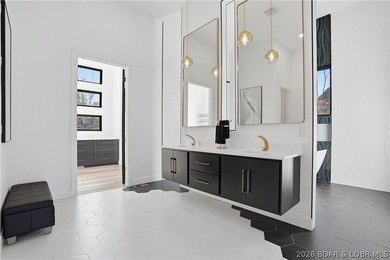 This striking new-construction estate commands panoramic main - photo 16