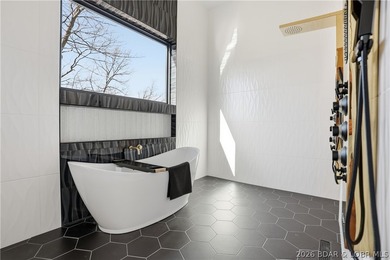 This striking new-construction estate commands panoramic main - photo 17