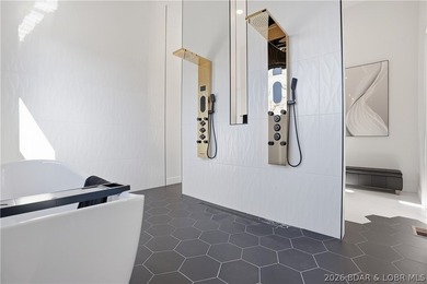 This striking new-construction estate commands panoramic main - photo 18