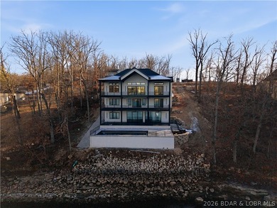 This striking new-construction estate commands panoramic main - photo 24