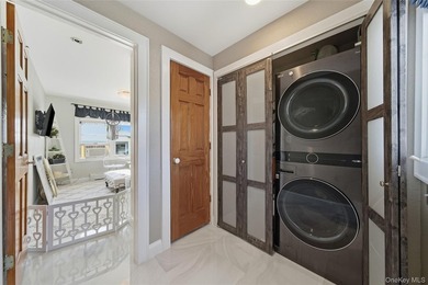 Experience life on the water in this beautifully updated - photo 24