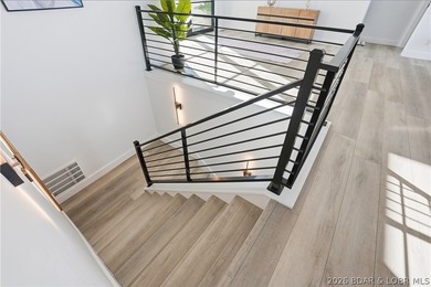 This striking new-construction estate commands panoramic main - photo 25