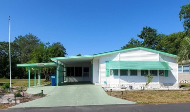 THIS HOME IS ON LEASED LAND WITH A MONTHLY LOT RENT OF $620 AND - photo 3