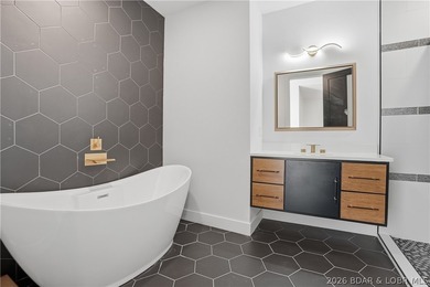 This striking new-construction estate commands panoramic main - photo 37