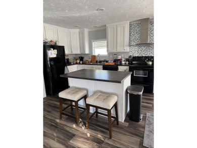Welcome to 56 Manor Drive, a stunning property nestled in the - photo 11