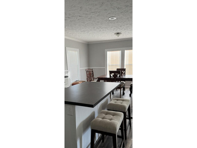 Welcome to 56 Manor Drive, a stunning property nestled in the - photo 12