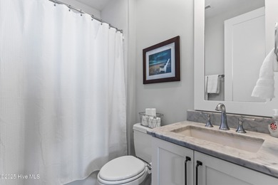 Discover the charm of riverfront living in this stunning