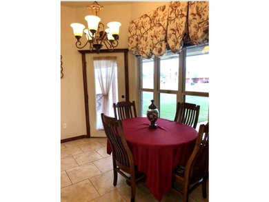 Welcome home to this beautifully maintained custom-built home - photo 9