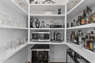 Discover the charm of riverfront living in this stunning