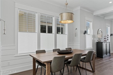 Discover the charm of riverfront living in this stunning