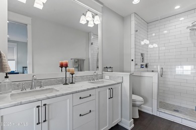 Discover the charm of riverfront living in this stunning