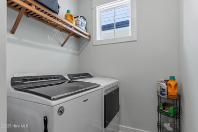 Discover the charm of riverfront living in this stunning