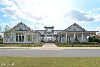 Discover the charm of riverfront living in this stunning