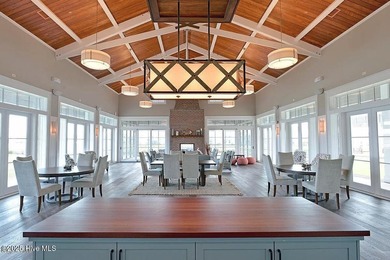 Discover the charm of riverfront living in this stunning