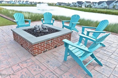 Discover the charm of riverfront living in this stunning