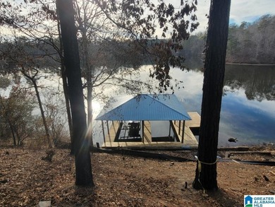 You will love this *ready to build* lakefront double lot with - photo 6