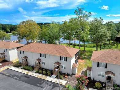 Experience the beauty of lakeside living in this exceptional - photo 2
