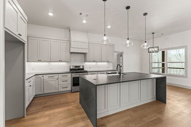 *Agent Owned* A modern new construction delight just a half mile - photo 9