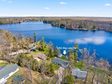 PRICE JUST REDUCED of this CHARMING LAKEFRONT RETREAT ON - photo 1