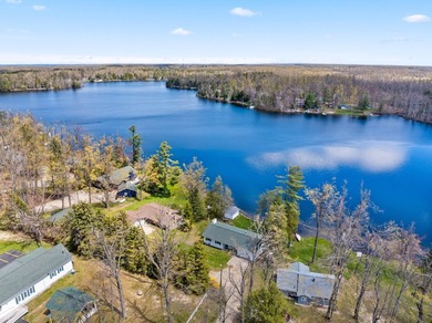 PRICE JUST REDUCED of this CHARMING LAKEFRONT RETREAT ON - photo 2