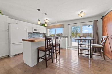 PRICE JUST REDUCED of this CHARMING LAKEFRONT RETREAT ON - photo 10