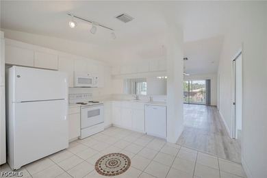 Wake up to panoramic lake views, soaring ceilings, and the - photo 17