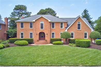 Welcome to this stunning all-brick home in the highly sought - photo 1