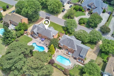 Welcome to this stunning all-brick home in the highly sought - photo 2