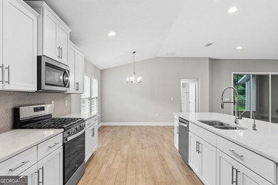 Welcome to this beautiful 4-bedroom, 3-bath home located in a - photo 23