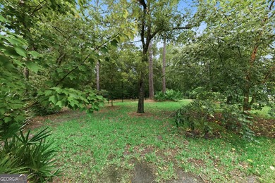 Welcome to this beautiful 4-bedroom, 3-bath home located in a - photo 37