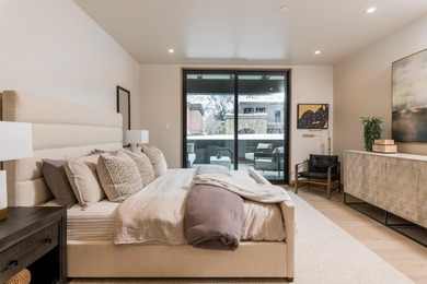 Stunning second floor luxury condominium in the heart of