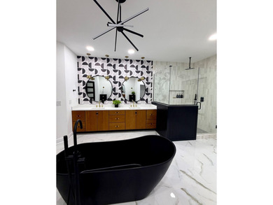 Discover this completely remodeled 5-bedroom, 4.5-bath home that - photo 38
