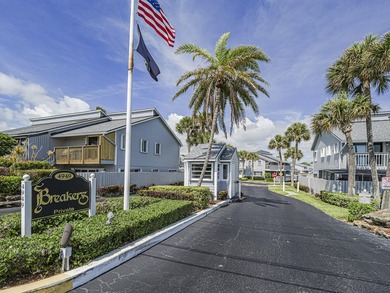 Are you dreaming of a beach house to call your own? This updated - photo 2