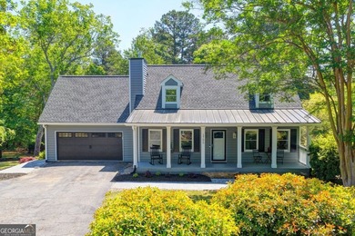 Your private lakeside retreat awaits. Set on spacious acreage in - photo 1