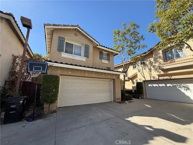 Welcome to 25323 Bayside, a two-level townhome nestled in the - photo 1