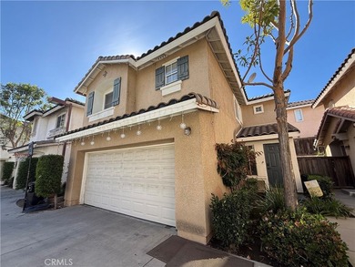 Welcome to 25323 Bayside, a two-level townhome nestled in the - photo 2