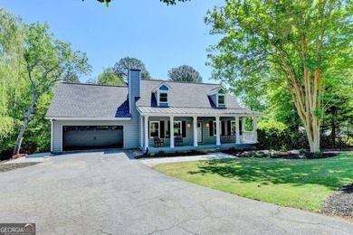 Your private lakeside retreat awaits. Set on spacious acreage in - photo 3