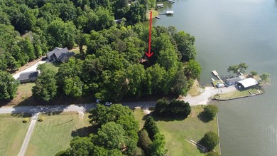 This lakefront property with two dwellings was once a beautiful - photo 3