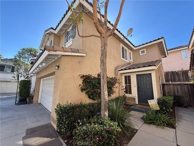 Welcome to 25323 Bayside, a two-level townhome nestled in the - photo 3